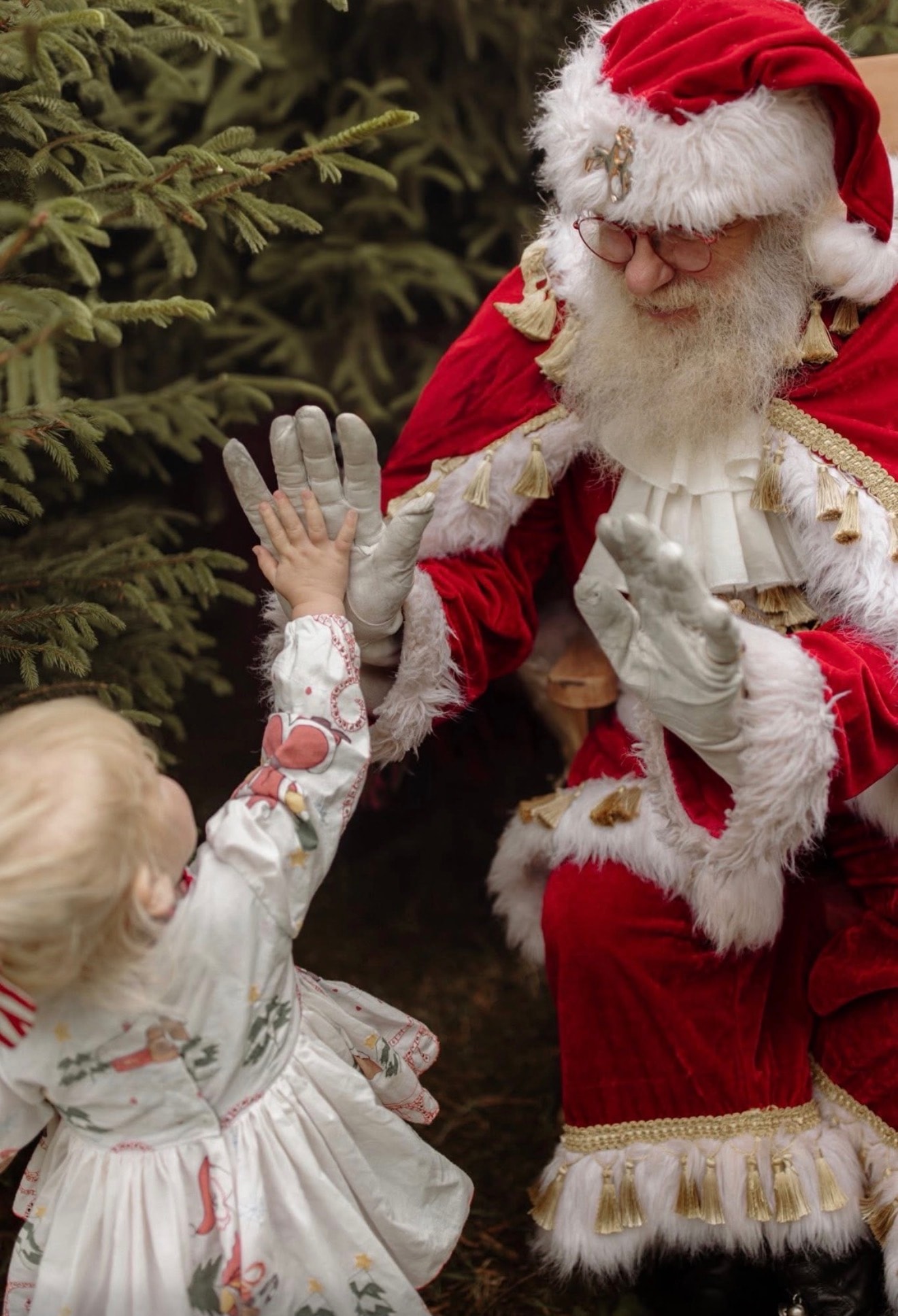 A high five from Father Christmas — pure joy